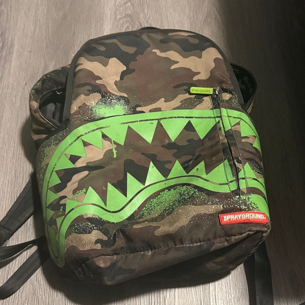 Sprayground Camouflage Backpack with Neon Green Highlights